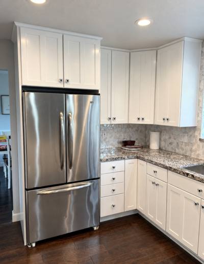 Kitchen remodel in Cameron Park, CA featuring white shaker cabinets, updated countertops and stainless steel appliances